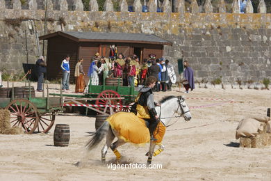 Torneo de justas, tiro de venablos y derribo del estafermo en la playa de Ribeira. Fiesta de la arribada - Baiona.