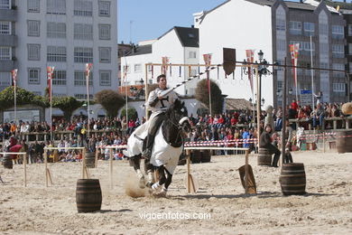 Torneo de justas, tiro de venablos y derribo del estafermo en la playa de Ribeira. Fiesta de la arribada - Baiona. 