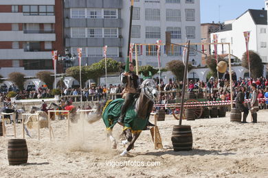 Torneo de justas, tiro de venablos y derribo del estafermo en la playa de Ribeira. Fiesta de la arribada - Baiona. 