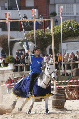 Torneo de justas, tiro de venablos y derribo del estafermo en la playa de Ribeira. Fiesta de la arribada - Baiona.