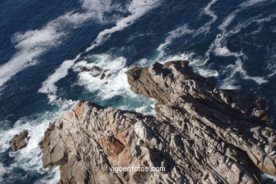 The rocky coast
(Landscapes of the islands)
. 