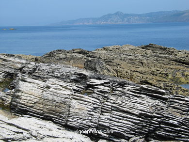 The rocky coast
(Landscapes of the islands)
. 