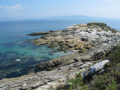 The rocky coast
(Landscapes of the islands)
. 