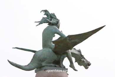 Monumento a los cantores, poetas y trovadores de la R�a de Vigo (de Xaime Quesada) . (2006). Calle Alfonso XII.
-  (Ver mapa). 