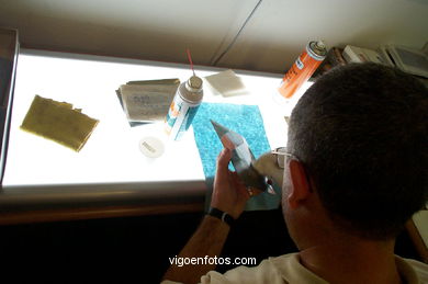 Proceso de limpieza y restauraci�n de la placa negativo. 