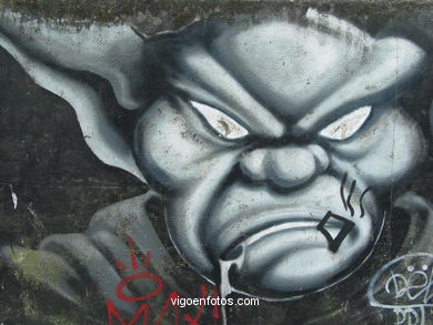 Graffiti en muro (detr�s colegio Maristas). 