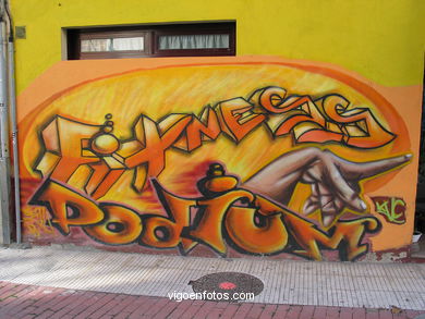 Graffiti en Gimnasio Podium (calle San Amaro). 