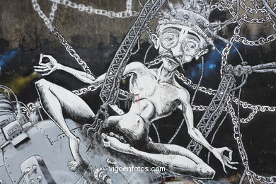 Graffiti junto a Hernán Cortés.