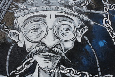 Graffiti junto a Hernán Cortés.