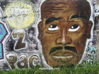 Graffiti en el paseo del río Lagares.