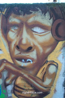 Graffiti en muro (detrás colegio Maristas).