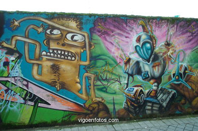 Graffiti en muro (detrás colegio Maristas).