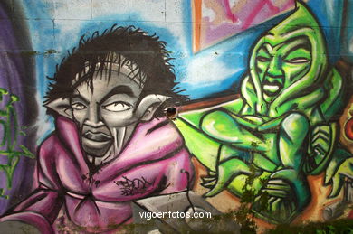 Graffiti en muro (detrás colegio Maristas).