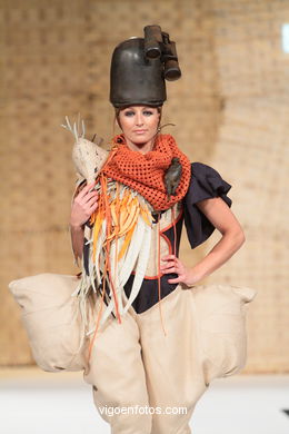 PAXAROS NA CABEZA. FASHION DESIGNER: EVA SOTO CONDE. RUNWAY FASHION OF YOUNG FASHION DESIGNER 2010